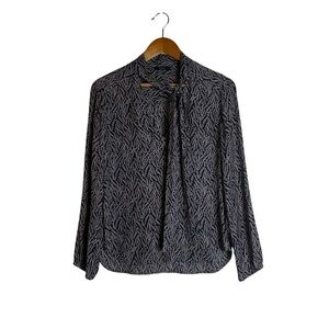 Talula patterned long sleeve blouse. Size medium